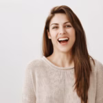 happy-carefree-woman-laughing-smiling-camera_176420-20755