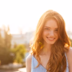 happy-pretty-redhead-woman-with-long-hair_171337-19289